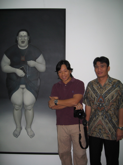 Kim Atienza and Ayala Museum's Ken Esguerra with Jojo Legaspi's "St Thelma"  
