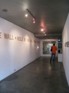View of installation, "Writing on the Wall+Hole in the Wall+Wall= Work"