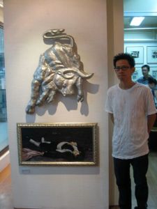 Jonathan Ching with his pieces, "Deja Vu (After Edouard Manet)"